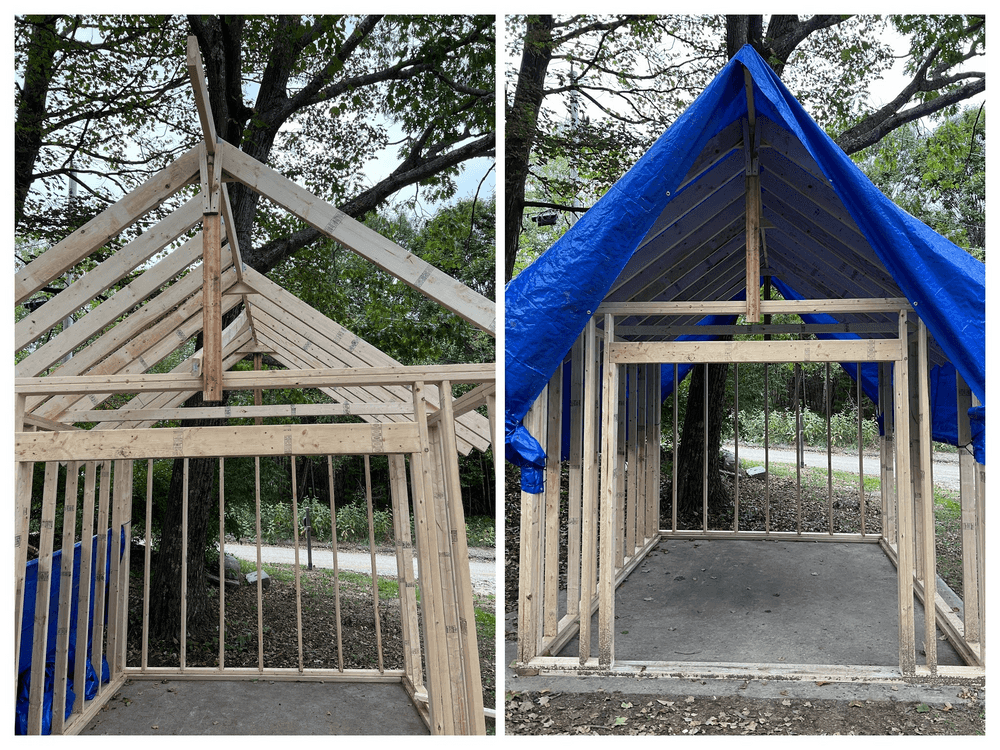 Roof framed. And tarped.